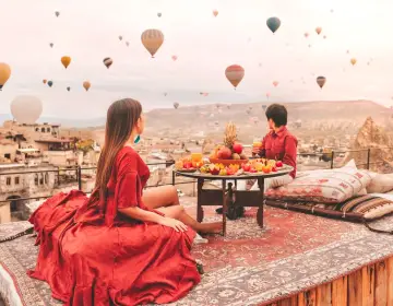 Panoramic terrace breakfast view with balloons