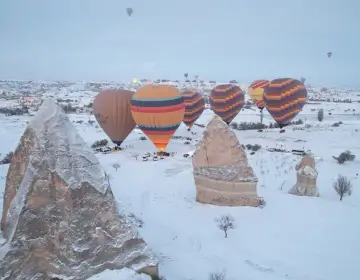 Wide panorama of colorful balloons in Cappadocia