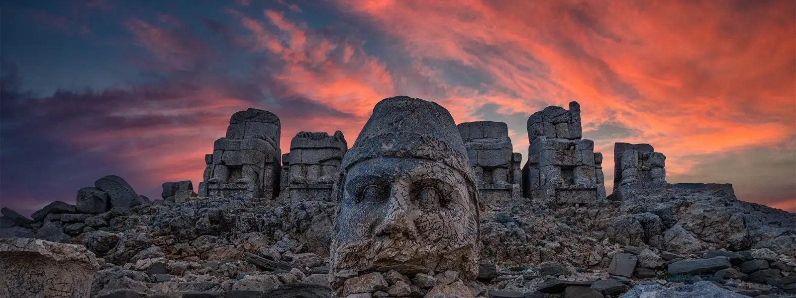 Sunset glow panorama over colossal statues at Nemrut