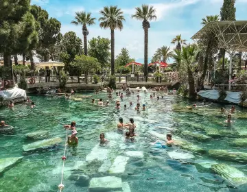 Swimming in Cleopatra hot spring pool Pamukkale Turkey