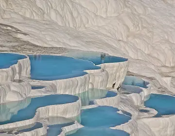 Bright white travertine terraces of Pamukkale Cotton Castle