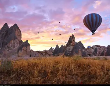 Golden hour hot air balloons over Cappadocia