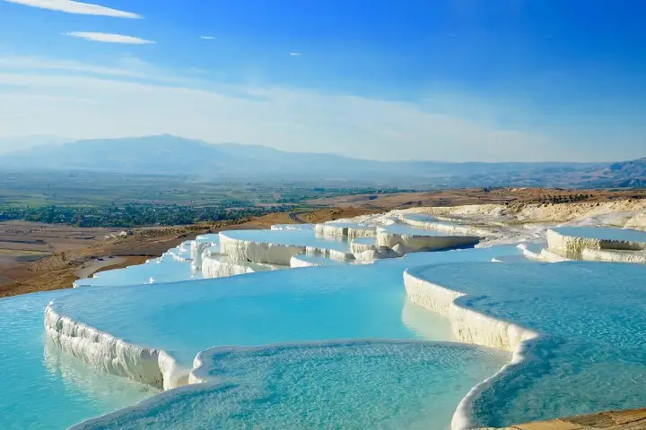 Tourist relaxing in the hot springs of Cleopatra Pool Pamukkale
