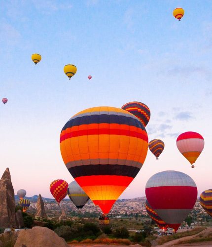 Morning balloon flight over Cappadocia rocks