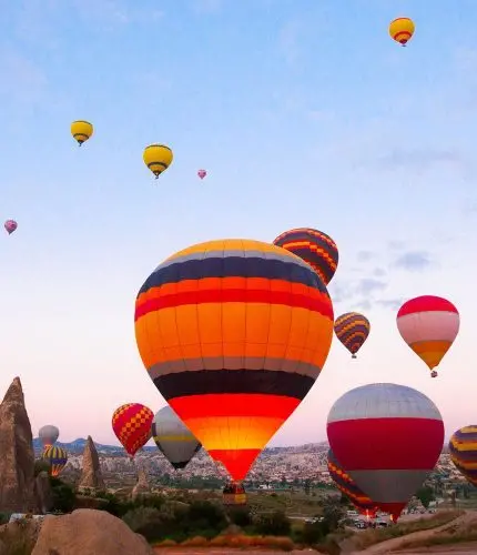 Morning balloon flight over Cappadocia rocks