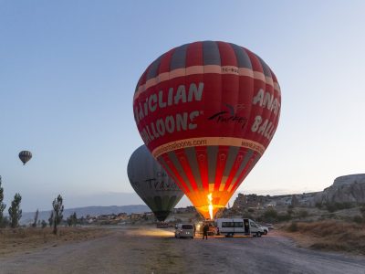 Sunset rock formations with hot air balloon