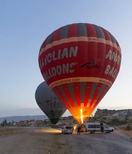 Sunset rock formations with hot air balloon