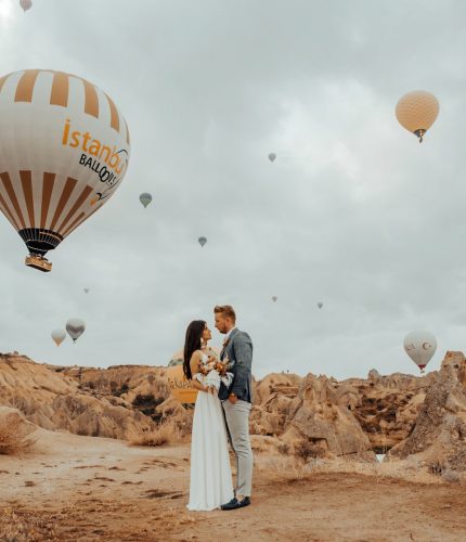 Wedding couple photoshoot with hot air balloons in Cappadocia