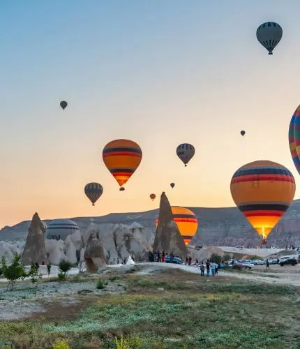 Colorful hot air balloons floating over Cappadocia