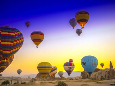 Colorful sunrise sky with Cappadocia balloons