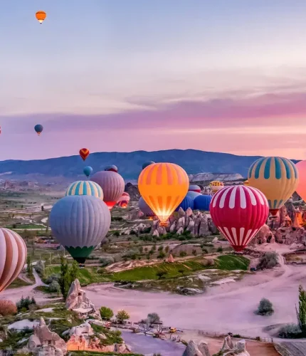 Sunrise glow launch of Cappadocia balloons