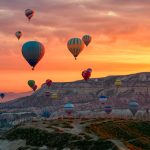Sunrise hot air balloons over Goreme valley