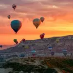 Sunrise hot air balloons over Goreme valley