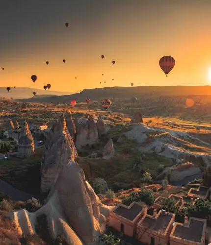 Hot air balloon liftoff during twilight in Cappadocia